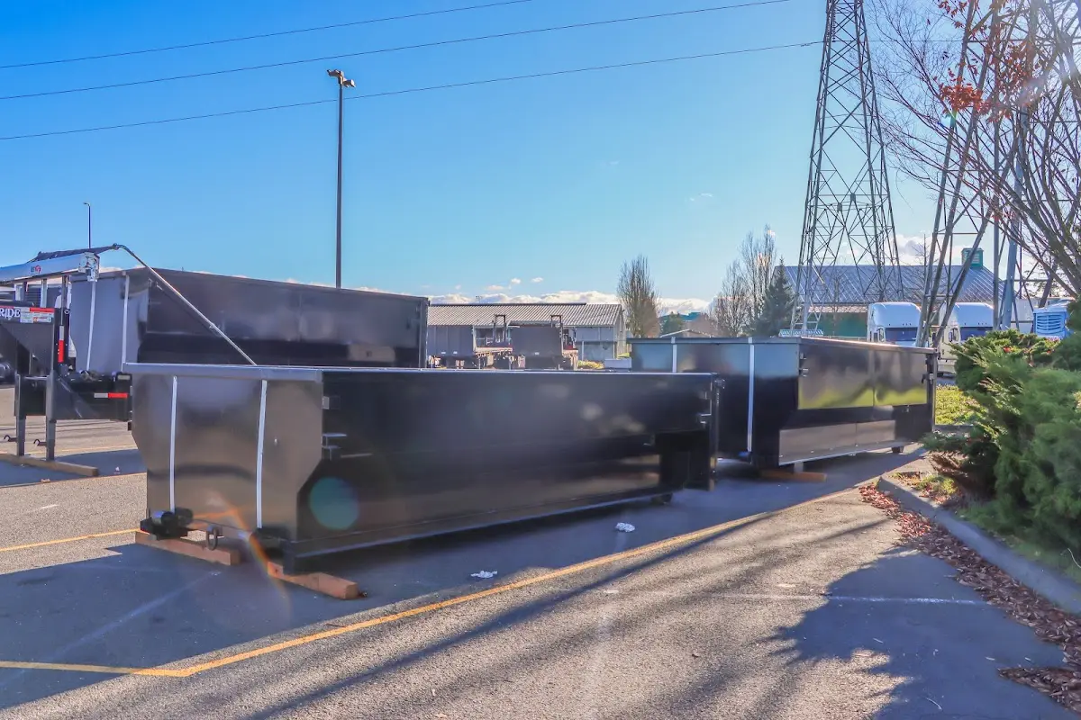 Roll-off dumpster ready for waste disposal at job site for 2 Yard Dumpster Rental in Gastonia